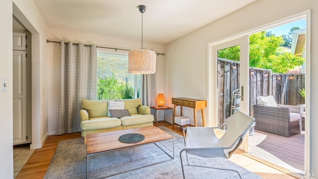 9 Endeavor Cv, Corte Madera, CA 94925 - living area with healthy amount of natural light, wood finished floors, and baseboards