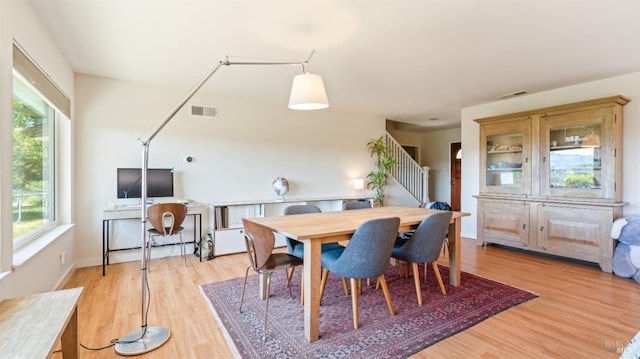 9 Endeavor Cv, Corte Madera, CA 94925 - dining space with light wood-style flooring and stairway