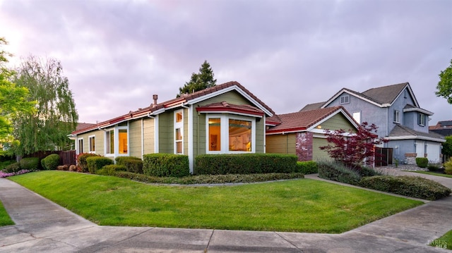 2001 Timberline Ln, Petaluma, CA 94954 - view of front facade featuring a front yard, an attached garage, and a tiled roof