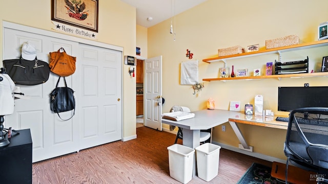 2001 Timberline Ln, Petaluma, CA 94954 - home office featuring wood finished floors, built in desk, and baseboards