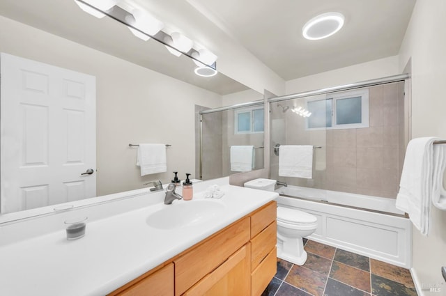 3730 Ruston Ln, Napa, CA 94558 - full bathroom with vanity, stone finish floors, toilet, and enclosed tub / shower combo