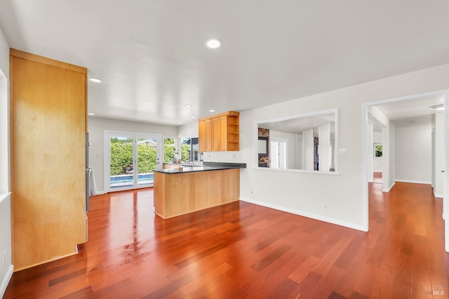 3730 Ruston Ln, Napa, CA 94558 - kitchen featuring open shelves, dark wood finished floors, a peninsula, baseboards, and recessed lighting