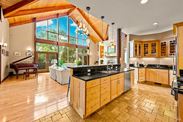 303 Mctavish Ct Unit A, Fairfield, CA 94534 - kitchen with stainless steel dishwasher, a wooden ceiling with exposed beams, light brown cabinets, recessed lighting, and glass insert cabinets