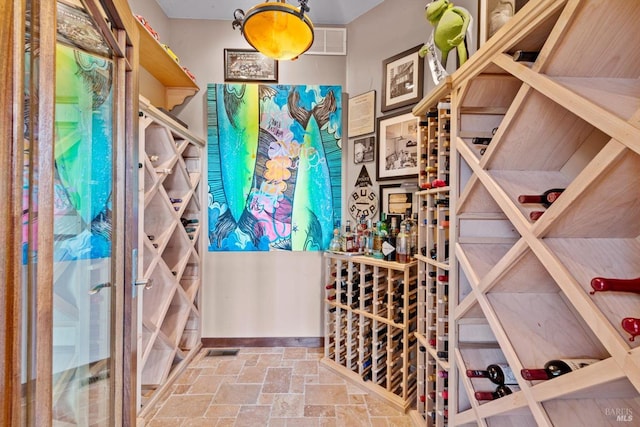 303 Mctavish Ct Unit A, Fairfield, CA 94534 - wine room featuring stone tile flooring and baseboards