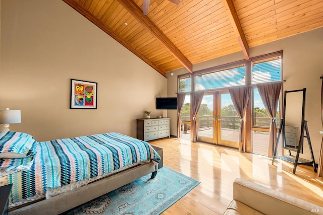 303 Mctavish Ct Unit A, Fairfield, CA 94534 - bedroom featuring a wooden ceiling with exposed beams, access to outside, french doors, wood finished floors, and high vaulted ceiling