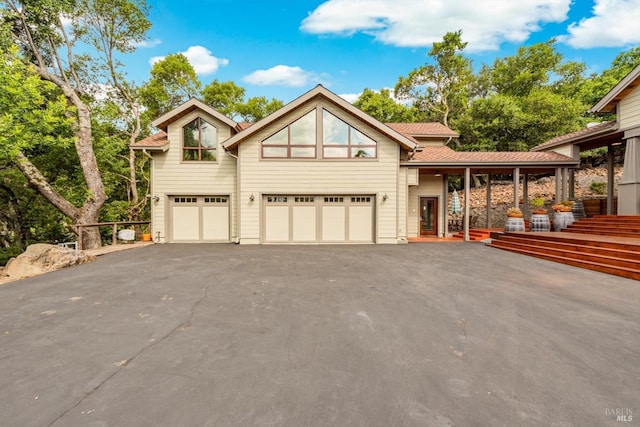 303 Mctavish Ct Unit A, Fairfield, CA 94534 - view of front facade featuring an attached garage, asphalt driveway, and a porch
