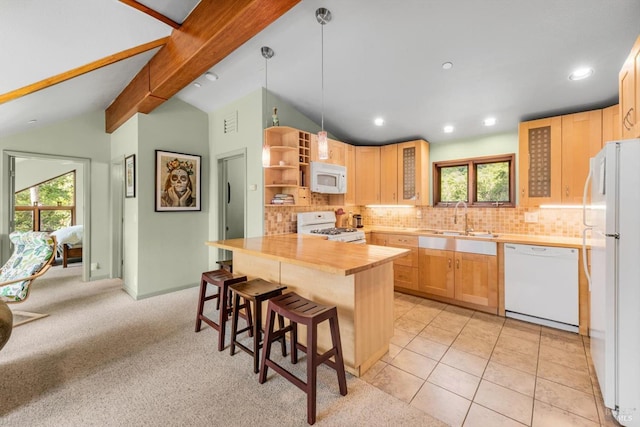 303 Mctavish Ct Unit A, Fairfield, CA 94534 - kitchen featuring white appliances, a sink, a kitchen bar, tasteful backsplash, and open shelves