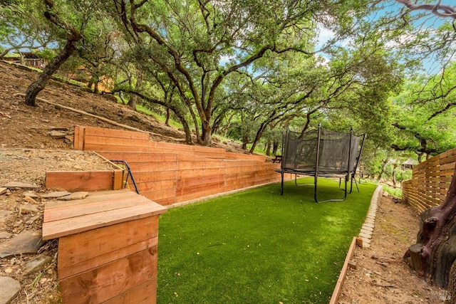303 Mctavish Ct Unit A, Fairfield, CA 94534 - fenced backyard featuring a trampoline