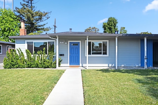 1313 Mcneil Ave, Petaluma, CA 94954 - view of front facade with a front lawn and a chimney