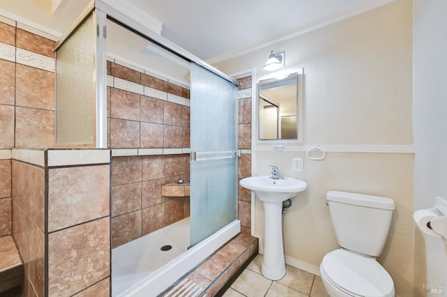1313 Mcneil Ave, Petaluma, CA 94954 - bathroom with a stall shower, toilet, tile patterned floors, and ornamental molding