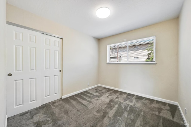 1313 Mcneil Ave, Petaluma, CA 94954 - unfurnished bedroom featuring carpet, baseboards, and a closet