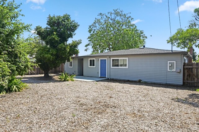1313 Mcneil Ave, Petaluma, CA 94954 - view of front of house with a fenced backyard and a patio