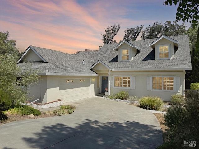 6 Kazen Way, Petaluma, CA 94952 - cape cod home with concrete driveway, a garage, stucco siding, and a shingled roof