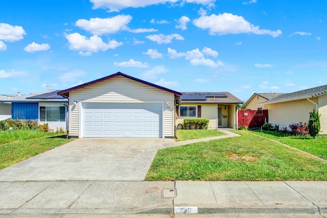 130 Ward Ct, Vallejo, CA 94589 - ranch-style home featuring a garage, solar panels, and concrete driveway