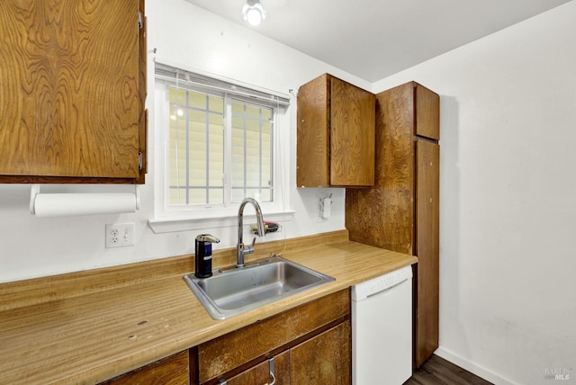 130 Ward Ct, Vallejo, CA 94589 - kitchen featuring dishwasher, a sink, light countertops, and brown cabinets