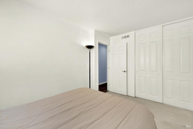 130 Ward Ct, Vallejo, CA 94589 - carpeted bedroom with a textured ceiling and a closet