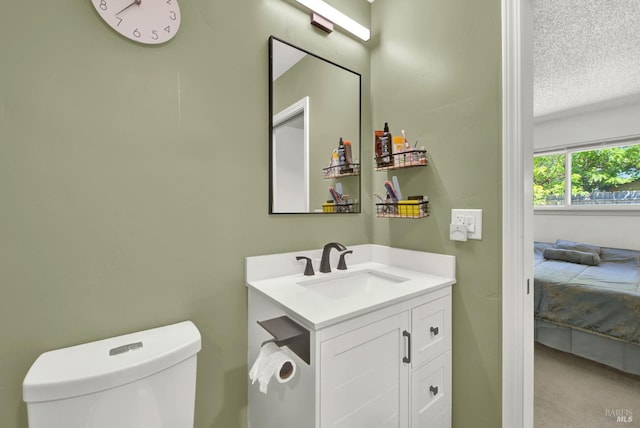 130 Ward Ct, Vallejo, CA 94589 - half bathroom with vanity, ensuite bathroom, toilet, and a textured ceiling