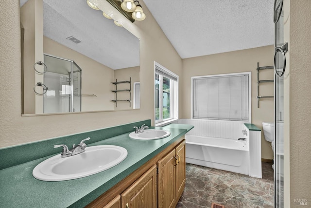 4538 Hill Rd, Lakeport, CA 95453 - bathroom with a garden tub, a textured ceiling, a shower stall, double vanity, and toilet