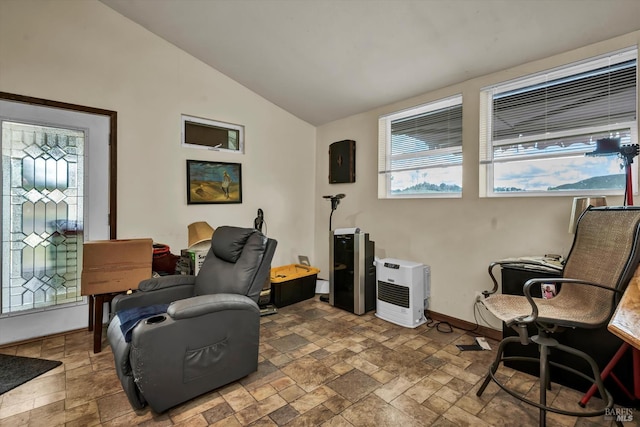 4538 Hill Rd, Lakeport, CA 95453 - living area with stone tile floors, lofted ceiling, and baseboards
