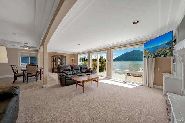 7753 N Cora Dr, Lucerne, CA 95458 - living area featuring crown molding, carpet, baseboards, and a ceiling fan