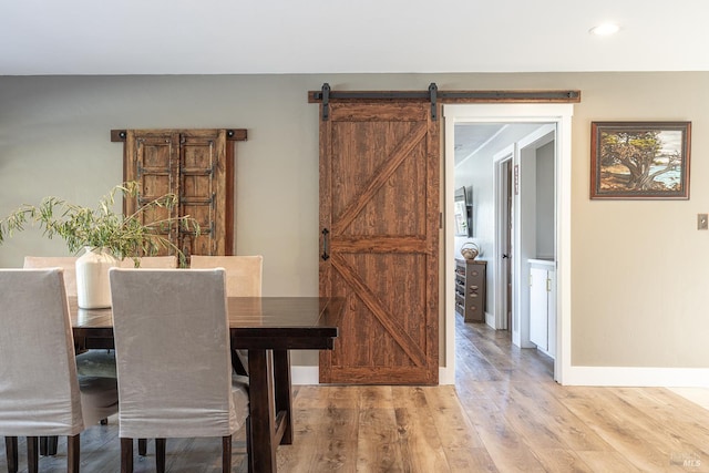 10505 Cherry Ridge Rd, Sebastopol, CA 95472 - dining area with light wood-type flooring, recessed lighting, a barn door, and baseboards
