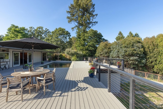10505 Cherry Ridge Rd, Sebastopol, CA 95472 - deck featuring an outdoor pool, outdoor dining space, and view of scattered trees