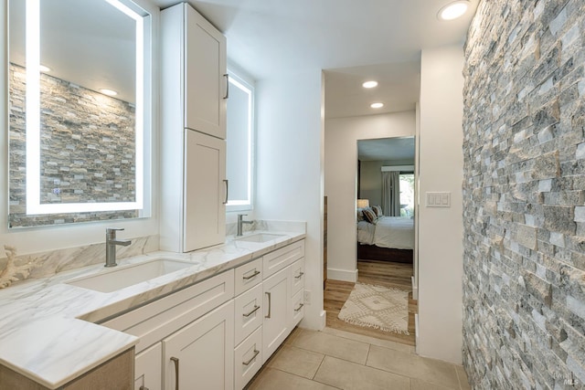 10505 Cherry Ridge Rd, Sebastopol, CA 95472 - ensuite bathroom featuring tile patterned floors, double vanity, and recessed lighting
