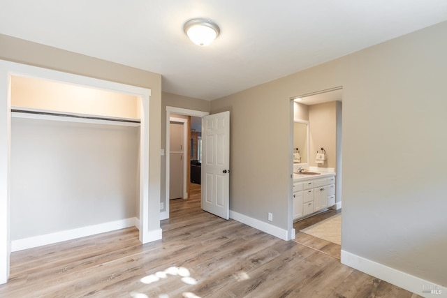 10505 Cherry Ridge Rd, Sebastopol, CA 95472 - unfurnished bedroom featuring baseboards, a closet, and light wood-style flooring