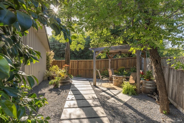10505 Cherry Ridge Rd, Sebastopol, CA 95472 - fenced backyard featuring a fire pit and a patio area