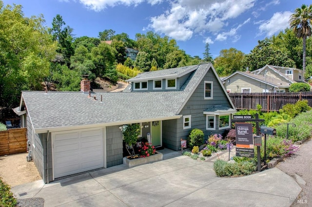 41 Salinas Ave, San Anselmo, CA 94960 - view of front facade with driveway, roof with shingles, and view of scattered trees