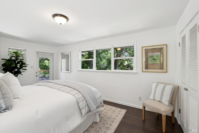 2120 Palmer Dr, Saint Helena, CA 94574 - bedroom featuring multiple windows, dark wood-style floors, a closet, and baseboards