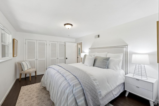 2120 Palmer Dr, Saint Helena, CA 94574 - bedroom with two closets, dark wood finished floors, and baseboards