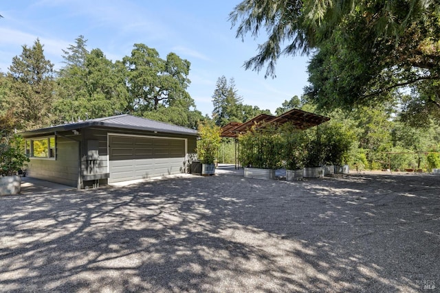 2120 Palmer Dr, Saint Helena, CA 94574 - view of side of property with a detached garage, cooling unit, and an outdoor structure