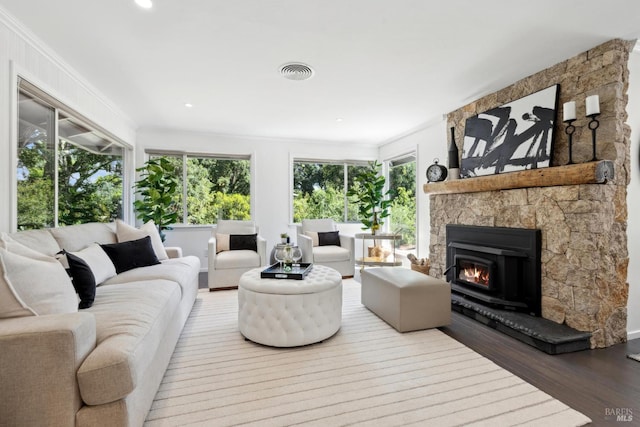 2120 Palmer Dr, Saint Helena, CA 94574 - living area with wood finished floors, a stone fireplace, crown molding, and recessed lighting