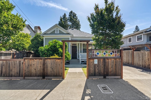 24 S University St, Healdsburg, CA 95448 - view of front facade with a fenced front yard and a porch