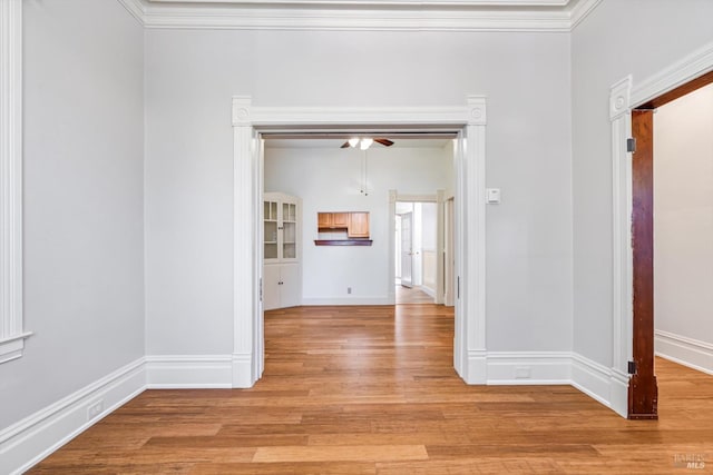 24 S University St, Healdsburg, CA 95448 - hallway featuring light wood-style floors, ornamental molding, and baseboards