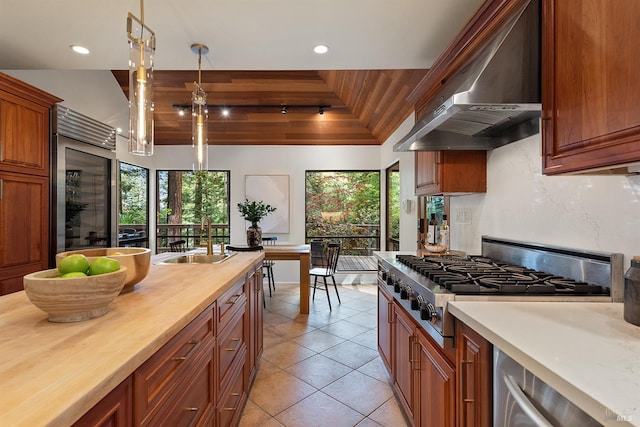 1655 Jonive Rd, Sebastopol, CA 95472 - kitchen featuring wall chimney range hood, a sink, healthy amount of natural light, wood counters, and wooden ceiling