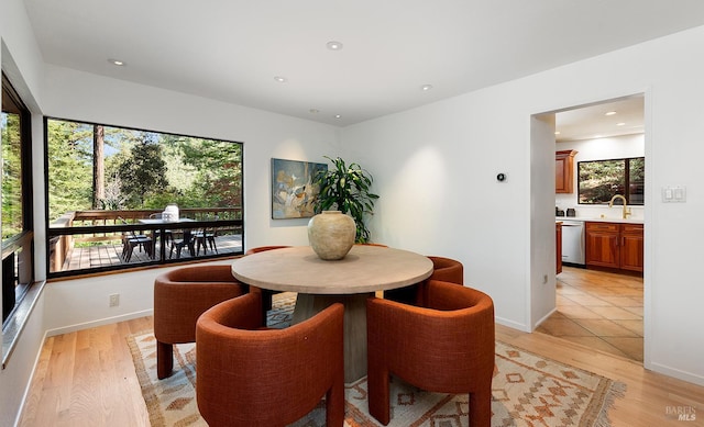 1655 Jonive Rd, Sebastopol, CA 95472 - dining area with healthy amount of natural light, light wood-type flooring, recessed lighting, and baseboards