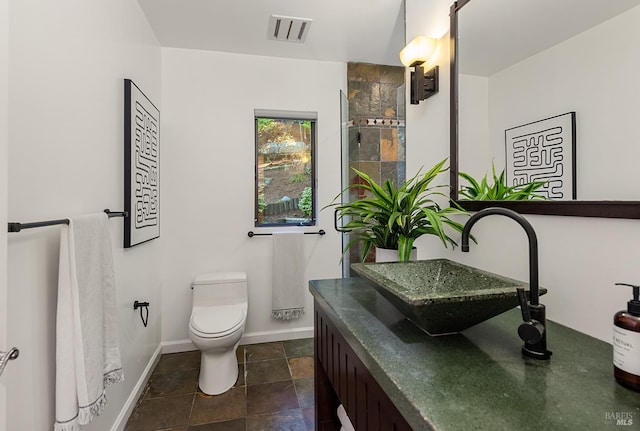 1655 Jonive Rd, Sebastopol, CA 95472 - full bath with baseboards, vanity, toilet, and a tile shower