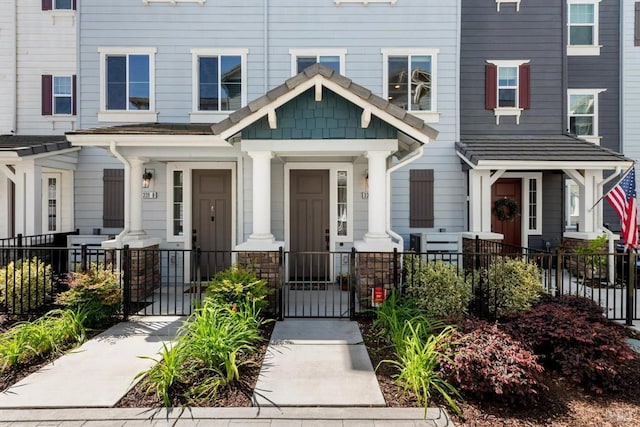 339 Pear Tree Ter Unit C, Napa, CA 94558 - view of front of home featuring a gate, covered porch, and stone siding
