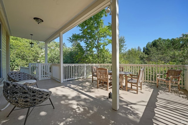 1423 Foothill Blvd, Calistoga, CA 94515 - view of patio with outdoor dining area and view of wooded area