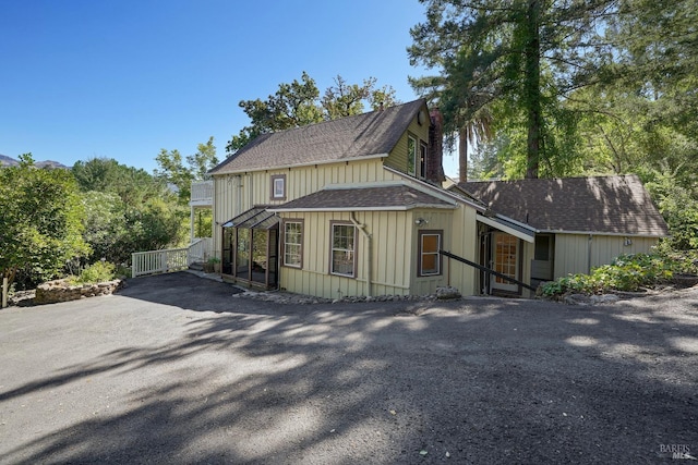 1423 Foothill Blvd, Calistoga, CA 94515 - view of front of property with roof with shingles, a chimney, and driveway