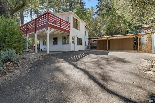 1423 Foothill Blvd, Calistoga, CA 94515 - view of front facade featuring driveway, a deck, and a carport