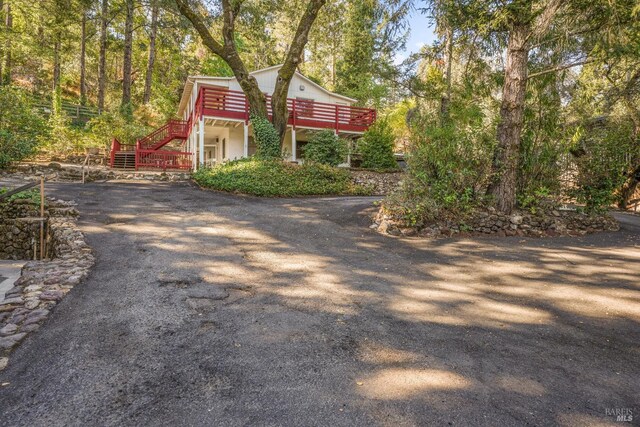1423 Foothill Blvd, Calistoga, CA 94515 - view of yard featuring stairway, driveway, and a deck