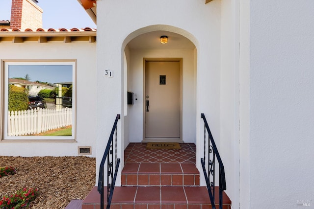 31 Laurel Ave, Petaluma, CA 94952 - entrance to property featuring stucco siding, a chimney, and a tile roof