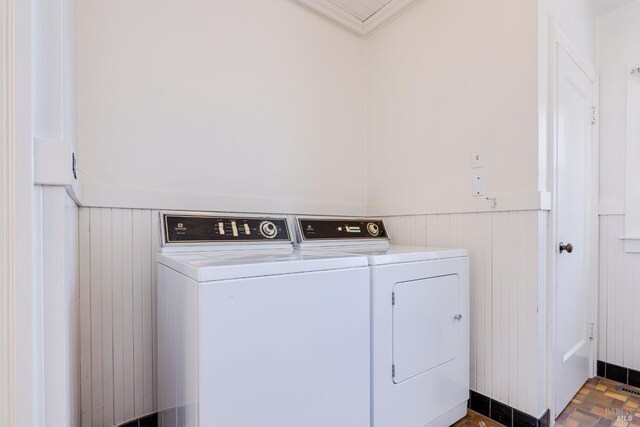 31 Laurel Ave, Petaluma, CA 94952 - laundry room with washing machine and dryer and a wainscoted wall