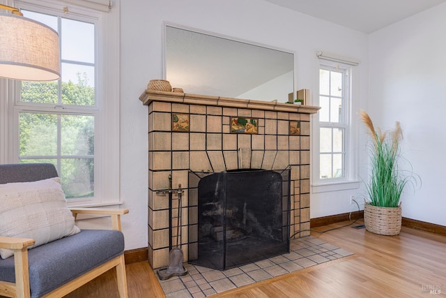 31 Laurel Ave, Petaluma, CA 94952 - detailed view of wood finished floors, baseboards, and a tiled fireplace