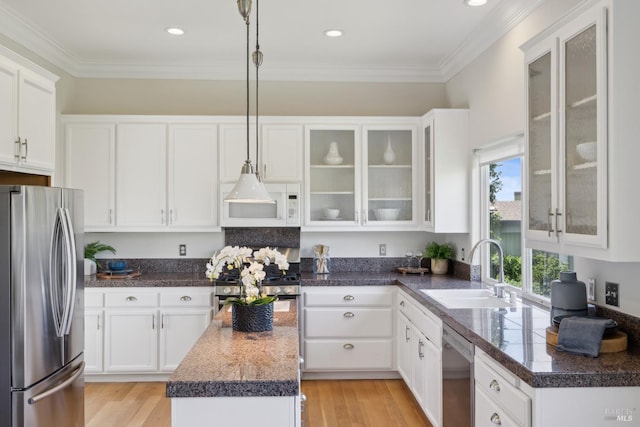 15 Upland Ln, Novato, CA 94945 - kitchen with stainless steel appliances, a sink, a kitchen island, white cabinetry, and recessed lighting