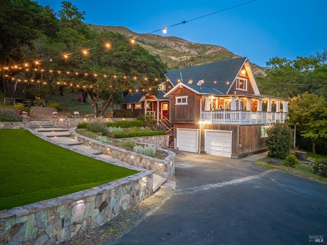 1114 Mount George Ave, Napa, CA 94558 - view of front of house with driveway, an attached garage, a front yard, a mountain view, and stairway