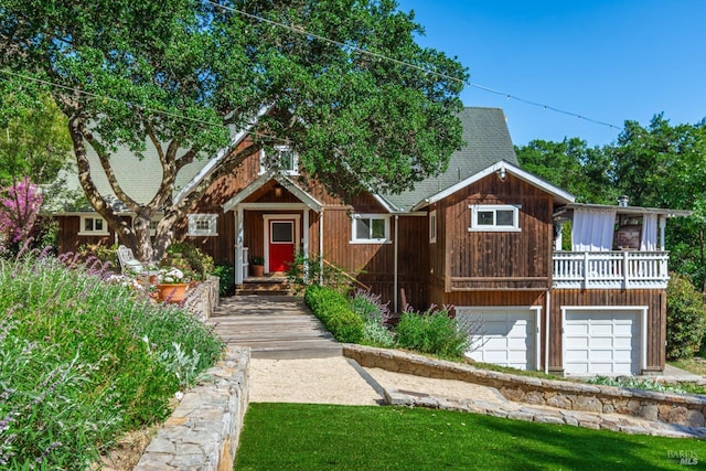 1114 Mount George Ave, Napa, CA 94558 - view of front facade with roof with shingles, a garage, and a balcony